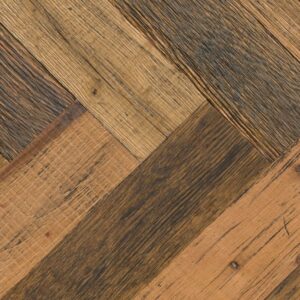 The contrasting characteristics of salvaged wood and precision cutting are fused to create stunning herringbone and chevron flooring. The creative process begins with selecting the finest materials from around the world which are shaped into extraordinary pieces of modern-day flooring by master craftsmen. Traditional methods are used throughout the process which begins with pressing 4mm veneers of history onto an FSC – certified plywood base for stability – each one cut meticulously for an exacting fit. Our Herringbone and Chevron collection is complemented with a matching plank format which is perfect for defining different spaces without compromising the overall desired effect. HERRINGBONE HISTORIC MADISON OAK 115 X 15 X 575MM